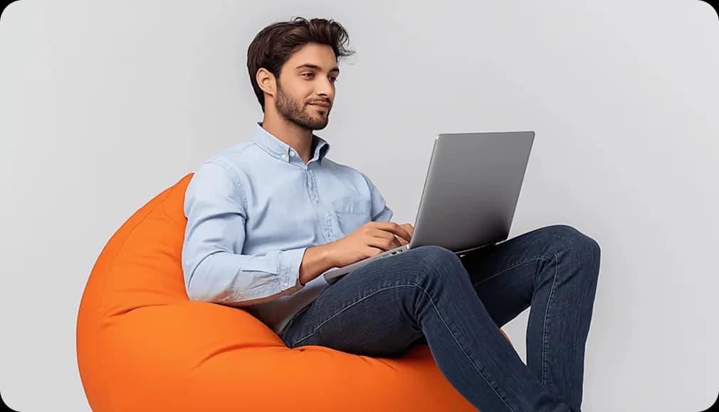 Learner sitting with laptop